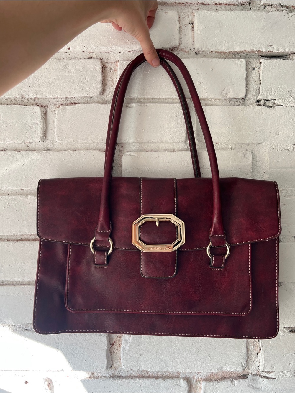 Classic Burgundy Womenโs Tote Bag with Gold Accent accordion two handle bag